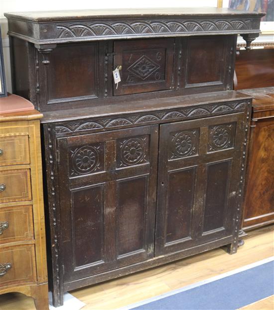 A 17th century style oak court cupboard W.125cm